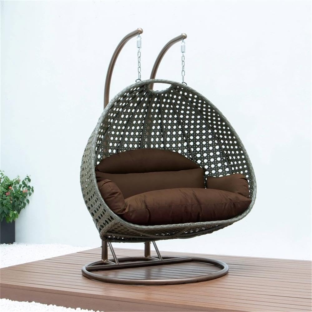 LeisureMod Brown Wicker 2 Person Egg Swing Chair with Beige Stand and Cushions – Double Hanging Hammock Lounge for Patio, Indoor & Outdoor Use