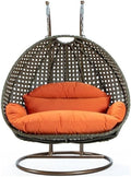 LeisureMod 2 Person Wicker Egg Chair Outdoor Indoor Bedroom Patio Hanging Lounge Swing Hammock Chairs with Beige Stand and UV Resistant Cushions, Orange