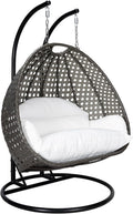 LeisureMod 2 Person Wicker Hanging Egg Chair, Indoor Outdoor Patio Swing with Black Stand & UV-Resistant Cushions, Lounge Chair for Bedroom & Garden, White