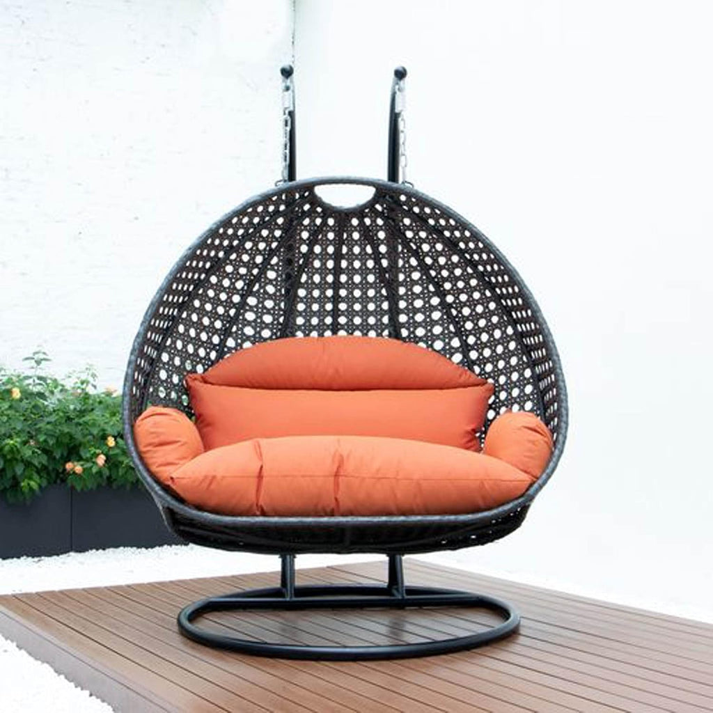 LeisureMod 2 Person Wicker Hanging Egg Chair, Indoor Outdoor Patio Swing with Black Stand & UV-Resistant Cushions, Lounge Chair for Bedroom & Garden, Orange