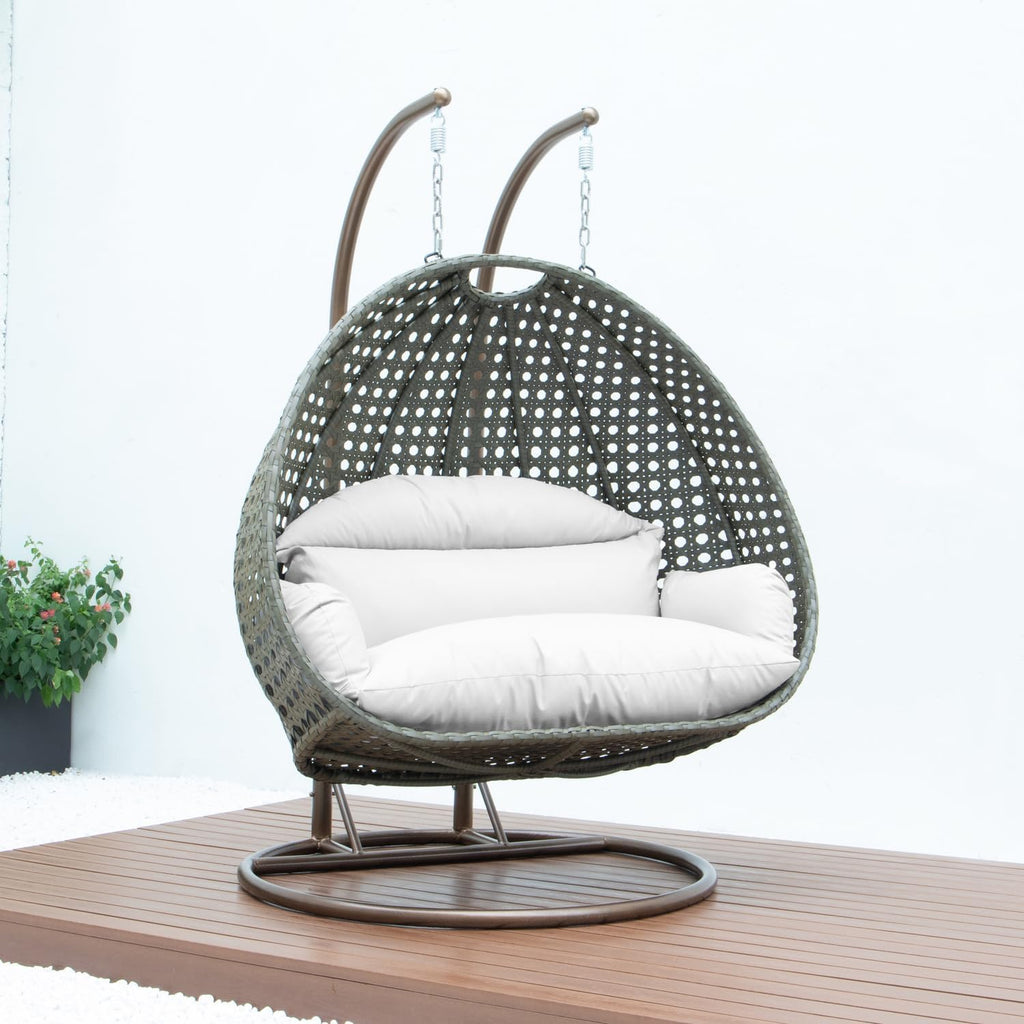 LeisureMod 2 Person Wicker Egg Chair Outdoor Indoor Bedroom Patio Hanging Lounge Swing Hammock Chairs with White Stand and UV Resistant Cushions (White)