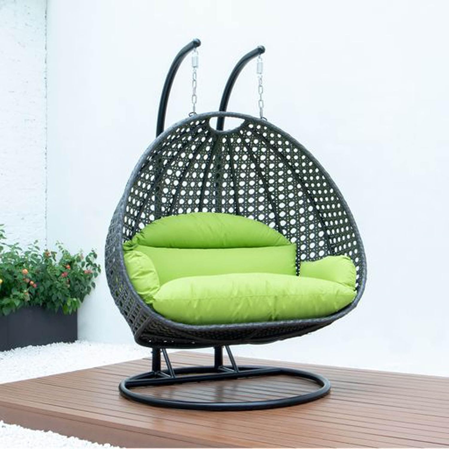 LeisureMod 2 Person Wicker Hanging Egg Chair, Indoor Outdoor Patio Swing with Black Stand & UV-Resistant Cushions, Lounge Chair for Bedroom & Garden, Light Green