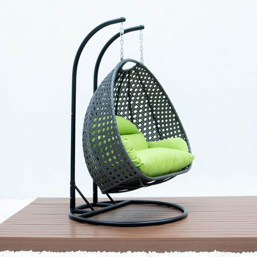 LeisureMod 2 Person Wicker Hanging Egg Chair, Indoor Outdoor Patio Swing with Black Stand & UV-Resistant Cushions, Lounge Chair for Bedroom & Garden, Light Green