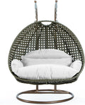 LeisureMod 2 Person Wicker Egg Chair Outdoor Indoor Bedroom Patio Hanging Lounge Swing Hammock Chairs with White Stand and UV Resistant Cushions (White)