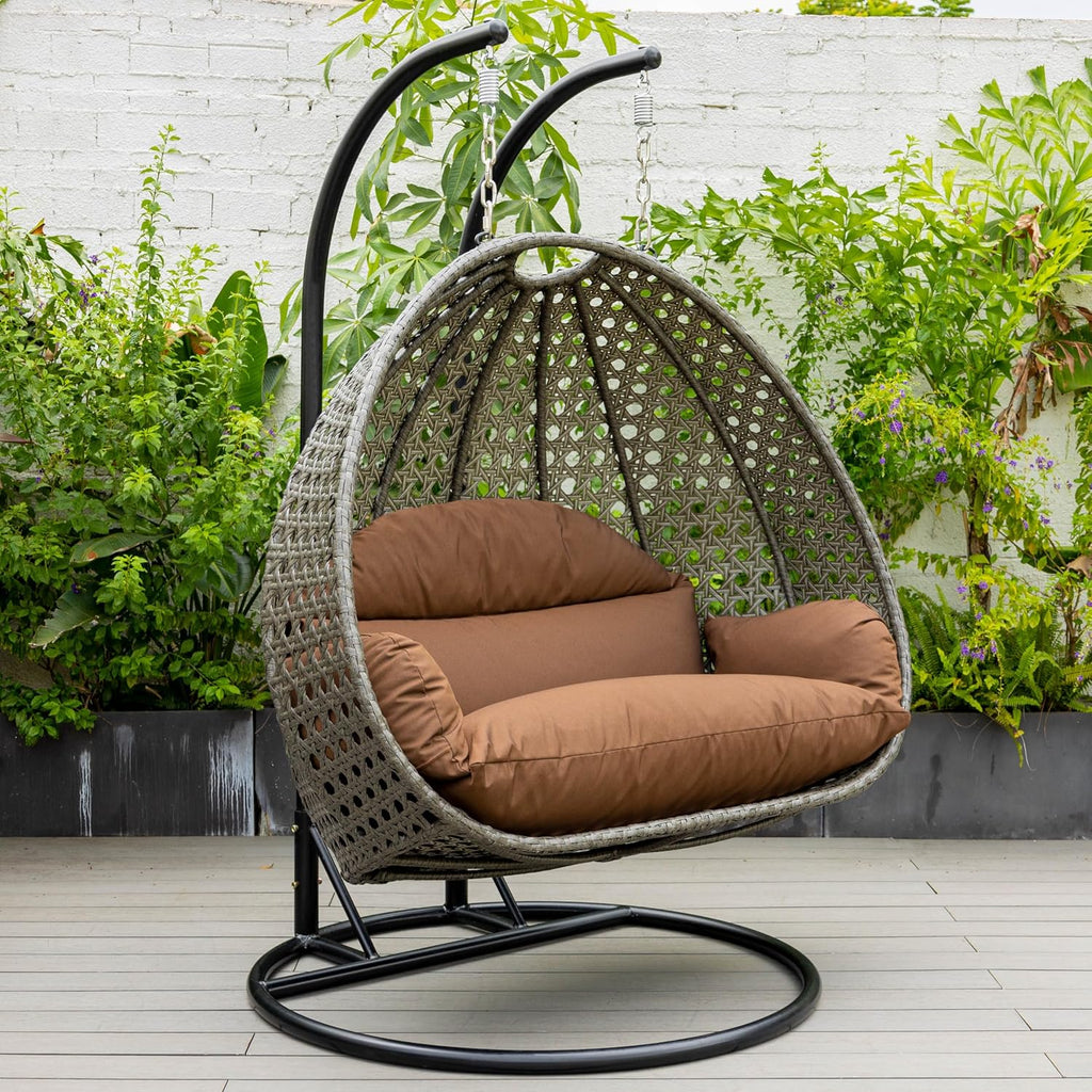 LeisureMod 2 Person Wicker Hanging Egg Chair with Stand & UV-Resistant Cushions for Indoor/Outdoor, Patio, Lounge, Hammock Seat, Brown